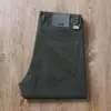Estación europea pantalones Tencel antiarrugas sin planchar verano finos antiadherentes color gris liso cinco bolsillos de negocios rectos casuales para hombre