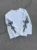 Top de manga larga estilo gótico europeo y americano con cruz de espinas para hombres y mujeres, con mangas estampadas en ambos lados, corte holgado, camiseta de manga larga con cuello redondo