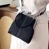 Bolso de mano de gamuza con diseño de nicho para comercio exterior para mujer, nuevo bolso retro con clip para teléfono, bolso de hombro cruzado versátil, moderno