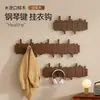 Perchero de pared elegante y bien diseñado para entrada, de madera maciza, con ganchos para dormitorio, sala de estar, perchero y colgador de sombreros de pared con forma de tecla de piano, colgador de bolsas