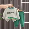Traje de primavera y otoño para niños y niñas estilo coreano nuevo moderno suéter de dibujos animados para niños traje casual de otoño para bebé