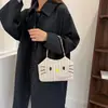 Linda bolsa de hombro tejida de dibujos animados con bordado de paja, nueva bolsa tote casual, elegante y minimalista para mujer 2026