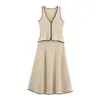 Novo vestido feminino de moda estilo europeu e americano com acabamento de cor contrastante e decote V, design sem mangas