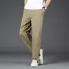 Pantalones de trabajo de alta gama de Hong Kong para hombre, corte recto holgado, estilo fino de verano 2026, talla grande, pantalones casuales de pierna ancha