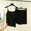 Nuevo modelo de verano conjunto de dos piezas de seda ECO color liso sin mangas, camisola y shorts para mujer, conjunto ligero para casa, pijama
