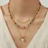 Estilo ins francés elegante simple personalidad joyería colgante cuadrado incrustado diseño de fritillaria collar bañado en oro de acero de titanio