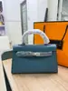 Elegante bolsa Kelly prateada com fivela e estampa de palmeira 2026 nova moda feminina segunda geração 22cm bolsa de mão bolsa de ombro transversal