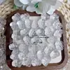 Nuevos accesorios de tallado a través del agujero para joyería DIY de cristal blanco valiente accesorios de juego estilo nacional al por mayor