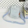 Bolso bandolera mini de color sólido estilo minimalista japonés con letra bordada, nuevo estilo casual para exteriores, bolsa ligera con cordón para botella de agua