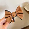 Grampo de Cabelo de Pelúcia de Alta Qualidade para Coque Outono e Inverno Grampo de Fixação para Rabo de Cavalo Alto Acessório de Cabelo Novo Presilha de Cabelo Versátil para Mulheres