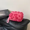Neceser en stock, bolso de peluche, nuevo bolso de maquillaje transfronterizo, bolso peludo, bolso para teléfono con forma de corazón, bolso de mano portátil