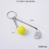 Venta caliente transfronteriza mini raqueta de golf de metal y colgante de bola para llavero de bolsa bola de golf pequeña