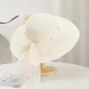 Sombrero de paja decoración de pared arreglo de escena exterior césped boda registro exterior celebridad de internet fondo de paisaje ambiente accesorios