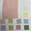 Suministro de Tela Jacquard Calada Mixta Nylon-Poliéster Tela Jacquard de Organza Semitransparente para Vestidos de Mujer y Faldas de Tutú de Primavera y Verano