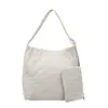 Bolsa Tote Casual Simples Coreana para Mulheres no Verão, Textura de Grande Capacidade, Bolsa de Ombro Transversal Versátil para Trabalho e Deslocamento