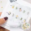 Paquete de material para manicura 2024 primavera y verano nuevo estilo mono mismo estilo hacha Corazón Torcido Cristal K9 diamante flash manicura al por mayor