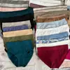 Bragas de color liso con estampado de letras europeas y americanas para mujer y niña en stock, estilo japonés transpirables, cómodas, sexys, bragas triangulares para niñas al por mayor