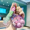 Brinquedo dispensador de água de dupla ação com tema de gato, chaveiro criativo de desenho animado, pingente de carro, acessório de chaveiro de mochila requintado para alívio do estresse fábrica