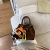 Bolsa Exclusiva de Nicho de Ombro Único para Mulheres 2026 Nova Vintage Versátil Bolsa Mãe-Filha Bolsa Transversal Bolsa de Mão Fashion Bolsa Saco