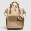 Nueva bolsa de maternidad de gran venta, bolsa de salida para mamá de gran capacidad, bolso de mano y mochila de moda, bolsa para mamá ligera y versátil