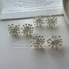 Pendientes de alta gama, geniales y elegantes estilo fuegos artificiales, minimalistas y de moda, adecuados para el uso diario, accesorios versátiles, venta al por mayor para mercados transfronterizos