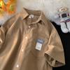 Camisa de manga corta estilo gofre para hombre, estilo retro de Hong Kong, versátil, holgada, estilo coreano, moderna y elegante.