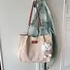 Bolsa de estudante universitária para mulheres, novo estilo minimalista 2026, bolsa de ombro moderna de grande capacidade, bolsa tote simples para o dia a dia