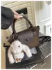 Bolso de Mano de Lujo con Estampado de Leopardo Tipo Bollo para Mujer Otoño 2026 Nuevo de Moda Otoño/Invierno Súper Caliente para el Trabajo Bolso Tote Pequeño de Hombro Cruzado