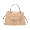 Bolsa de Mão Feminina Estilo Bolsa Kelly 2026 Moda Simples Bolsa de Ombro Bolsa Transversal Porta-Moedas Estoque de Fábrica Atacado