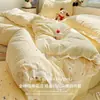 Nuevo modelo 2025 juego de ropa de cama de algodón de cuatro piezas con encaje de algodón, funda de edredón, sábana, juego de ropa de cama de tres piezas para dormitorio