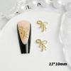 Joyería de aleación para uñas con forma de lazo de alta venta una variedad de accesorios decorativos para horquillas de uñas y pendientes estilo lujo ligero en oro y plata materiales