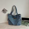 Bolsa de ganga de grande capacidade 2026 verão nova bolsa de mão casual para o dia a dia, bolsa tote feminina de estilo descontraído