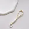 Correa de Muñeca Trenzada Estilo Ins Lanyard Nudado Cuerda Corta de Silicona Colgante Antiperdida para Teléfono Dopamina