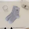Calcetines de estilo coreano color azul leche con oso de béisbol para mujer, para otoño e invierno, calcetines de media pantorrilla, calcetines de algodón de color claro suave, calcetines bordados vintage