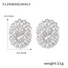Europa y Estados Unidos venta caliente transfronteriza talla anillo aretes de flor hueca acero titanio chapado oro 18K aretes exagerados joyería mujer