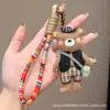 Muñeca de tela estilo bosque oso adorno colgante llavero de cuerda trenzada hecho a mano colgante decoración de bolsa estilo artístico colgante versátil
