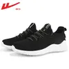 Zapatillas para hombre Warrior 2026 verano nuevas transpirables casuales zapatillas ligeras para correr zapatillas de punto fly-knit para hombre