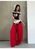 Fabricante Original Estilo Americano Falso Dos Piezas Patchwork Bloques de Color Estampado de Letras Pantalones Deportivos Diseño Unisex Holgados de Pierna Ancha