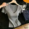 Lujo Ligero Calado Bloque de Color Moda Tejido Verano 2026 Nuevo Estilo Exquisito Chic Estilo Casual Reductor de Edad Top de Manga Corta