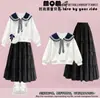 Conjunto de duas peças estilo preppy para meninas para o início do outono: moletom estiloso com gola Peter Pan, laço e saia branca em camadas