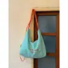 Bolsa de Lona Grande Capacidade Estilo Coreano Feminina 2026 Nova Casual Versátil Bordado de Letra Ombro Único Transversal