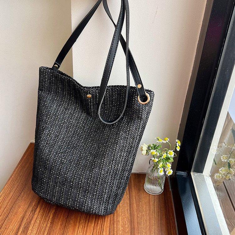 编织包女包新款潮2024夏草编简约百搭小清新水桶包个性单肩斜