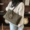 Bolso tote vintage de un solo hombro para otoño, gran capacidad, modelo nuevo, sensación de lujo ligero, bolso de mujer exquisito con estampado de leopardo 2026