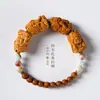Estilo étnico cuatro no pequeños Buda cuatro no zachilam pulsera Wenwan pulsera de rosario de sándalo de Laoshan plato pulsera para jugar