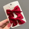 Pinza para el pelo multicolor linda de venta caliente, corbata de lazo pequeña para niños, pinza para el pelo de bebé, color puro, estilo simple para mujer