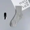 Meias para Homens e Mulheres Cano Longo Cor Sólida Desodorante Absorvente de Suor Respirável Esportivas Basquete Meias Masculinas Primavera e Outono Esportivas de Algodão Atacado