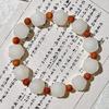 Pulsera de bodhi de flor flotante en polvo natural para hombres y mujeres camelia anillo individual pulsera de mano cuentas cuentas texto placa de juego cuerda venta al por mayor