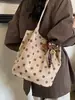 2026 moda nueva transfronteriza simple bolsa de mano de gran capacidad bolsa de hombro casual coreana de lunares bolsa de axila
