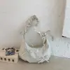 Bolsa de Axila Estilo Coreano de Nicho Nova Primavera Bolsa de Mão Plissada com Laço para Mulheres Bolsa Nuvem de Ombro Único