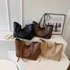 Bolso de mano retro de estilo coreano más vendido para mujer, nuevo modelo 2026, bolso de hombro para el trabajo, bolso de hombro de gran capacidad a la moda para mujer
